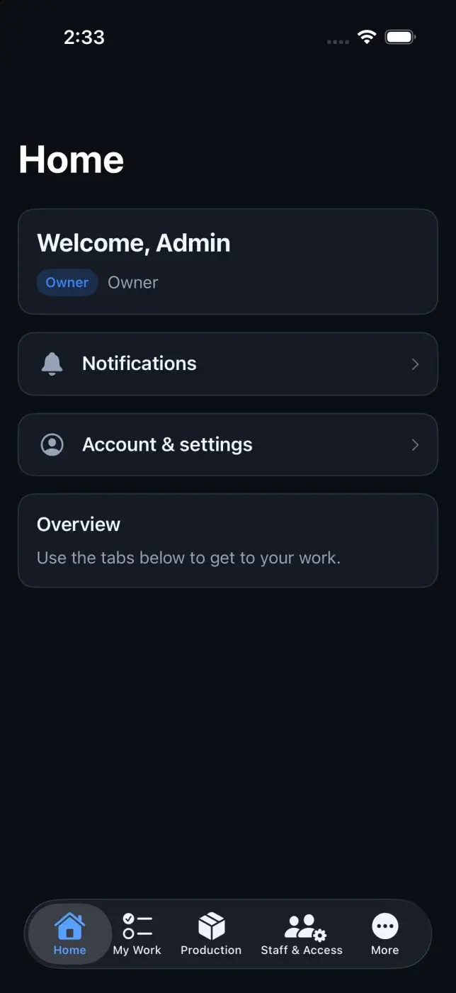 Team Azlo iPhone home screen in dark theme with a Welcome, Admin card showing the Owner access level, Notifications and Account & settings rows, and a tab bar with Home, My Work, Production, Staff & Access and More